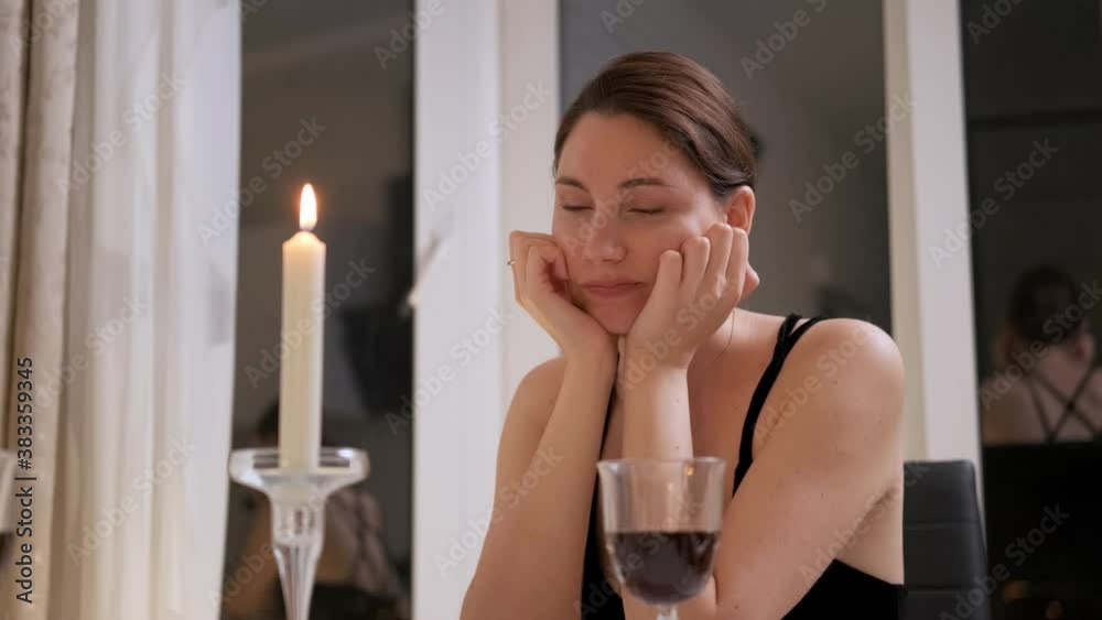 Beautiful young woman in a restaurant waiting for her boyfriend. The guy late. Sad girl is bored. Bad date Beautiful young woman in a restaurant waiting for her boyfriend. The guy late. Sad girl is bored. Bad date