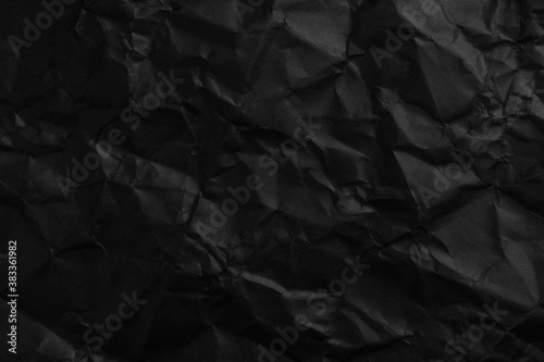 Crushed black paper abstract background