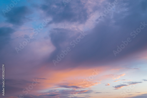 Colorful cloudy sky at sunset. Beautiful color transitions. Abstract background of nature.