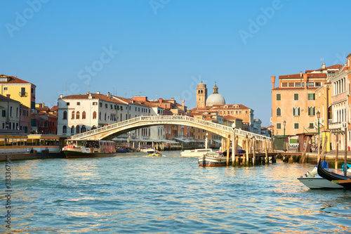 Traditional houses and foot bridge across on Grand Canal in Venice  Italy.
