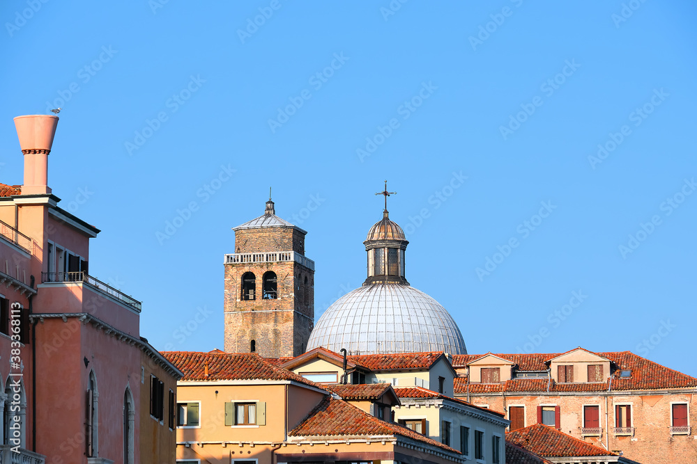 Cupola of Church of San Geremia and ancient Romanesque bell tower in Venice, Italy