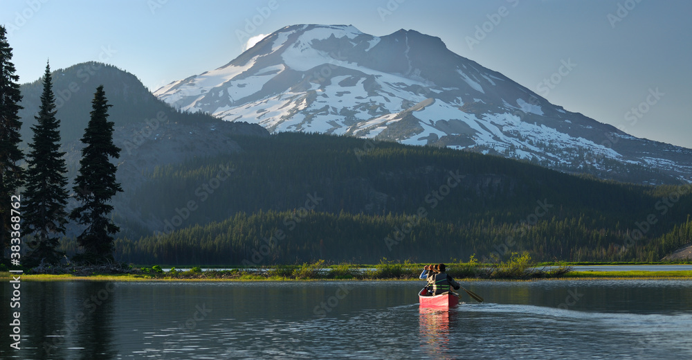Pair canoeing on Sparks Lake near Bend Oregon