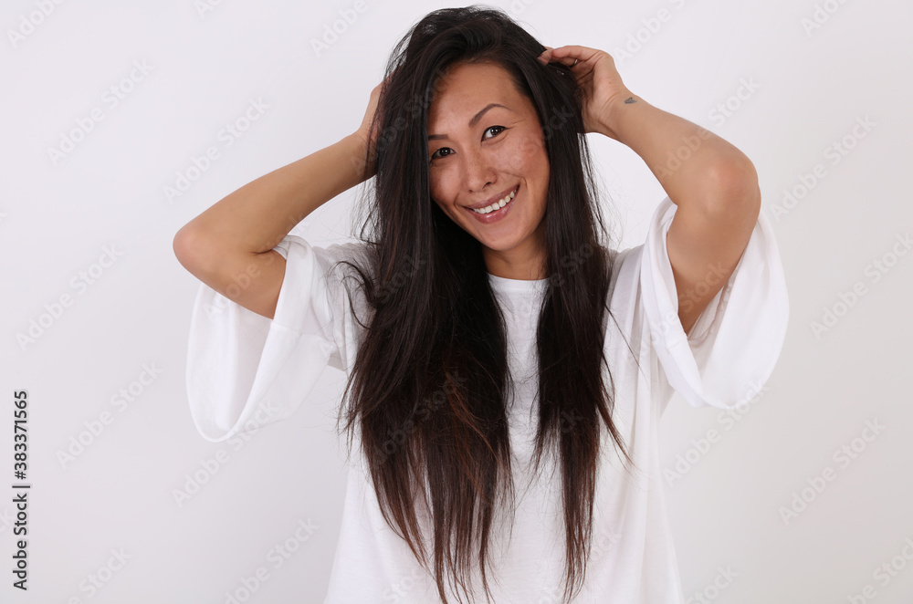 Authentic smiling Asian Woman portrait. Imperfect and true beauty. Realism and diversity concept Authentic smiling Asian Woman portrait. Imperfect and true beauty. Realism and diversity concept