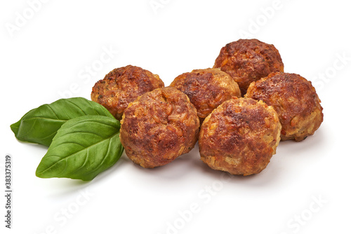 Фотография Baked pork meatballs, isolated on white background
