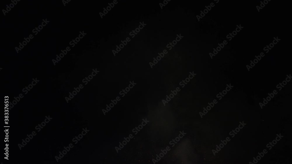 White and red fireworks in night sky, wide aerial White and red fireworks in night sky, wide aerial