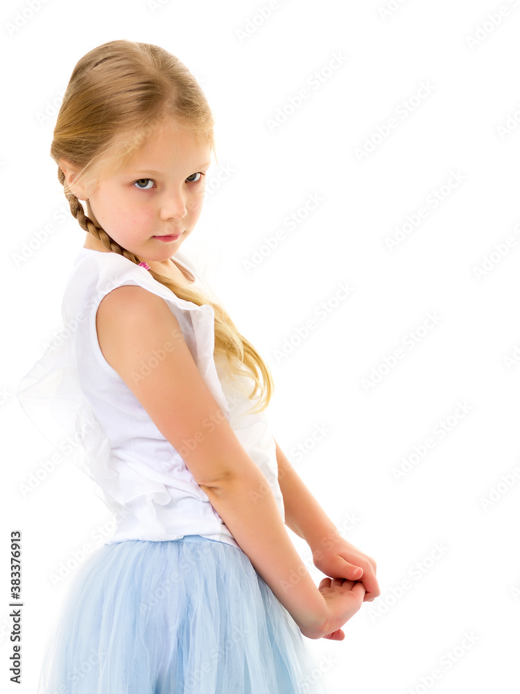 Charming little girl in a very beautiful dress. Close-up. Charming little girl in a very beautiful dress. Close-up.