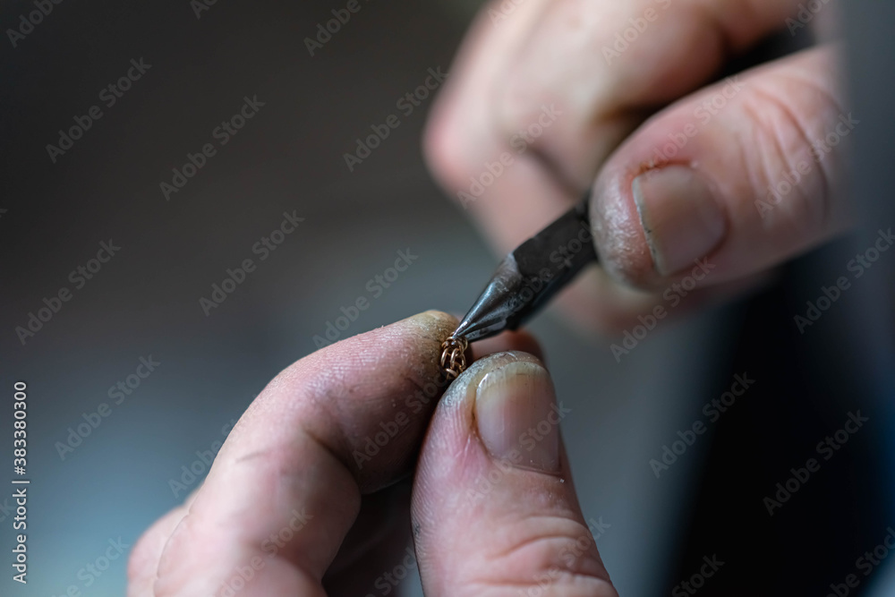 chain making process. jewelry making. making a gold chain by a jeweler. repair of the gold chain. jewelry repair. handmade jewelry. macro photography