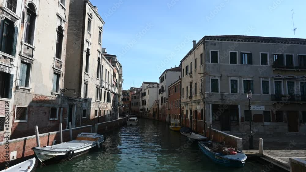 Venice, Italy - Walking through the less touristy streets of the lagoon city, among lesser-known canals, bridges and houses Venice, Italy - Walking through the less touristy streets of the lagoon city, among lesser-known canals, bridges and houses