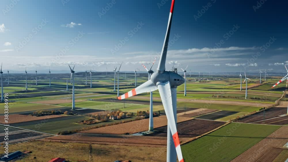Windmill in rural landscape