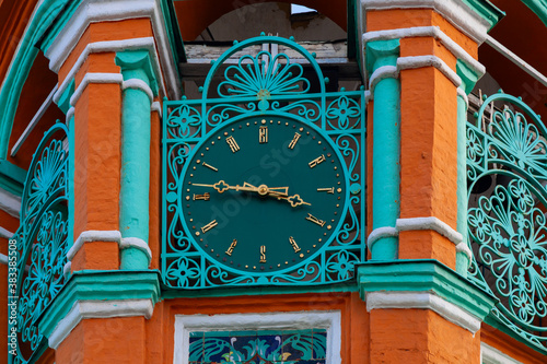 Antique tower clock on the bell tower of the Church of St. Gregory of Neocaesarea in Moscow photo