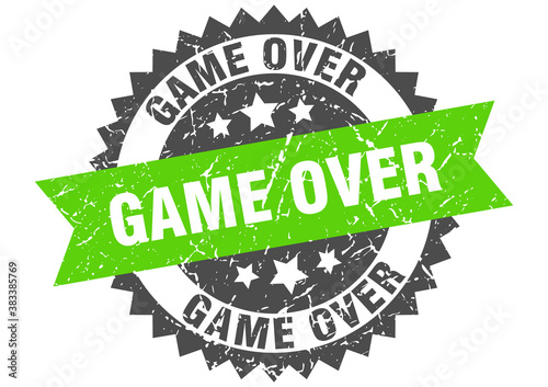 game over stamp. grunge round sign with ribbon