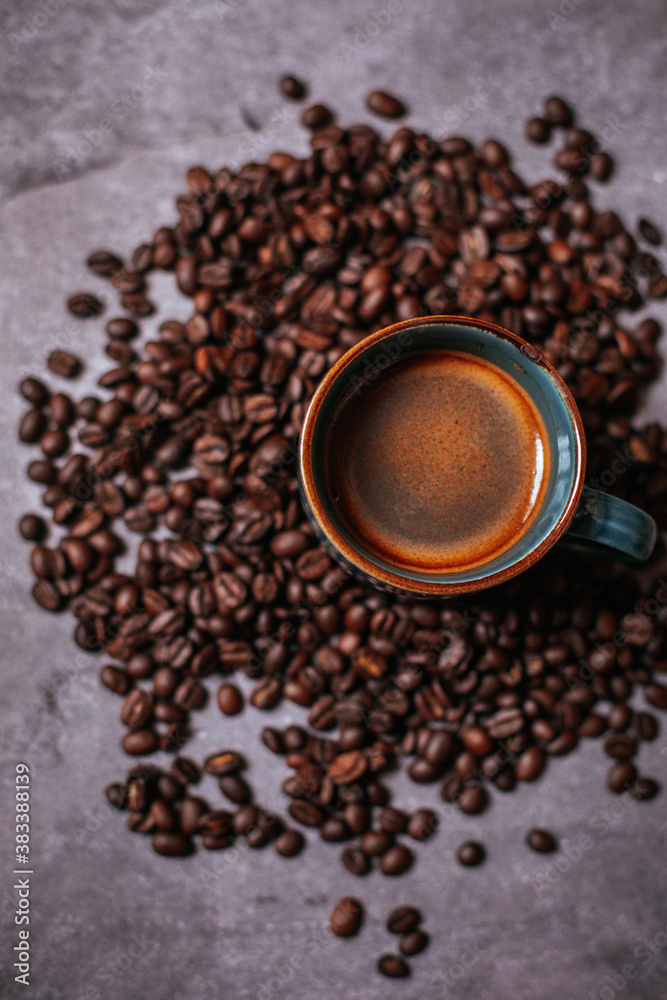 cup of coffee and coffee beans
cup of coffee and coffee beans