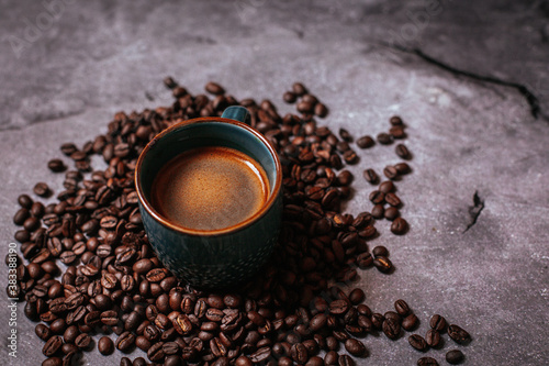  cup of coffee and coffee beans