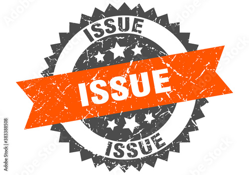 issue stamp. grunge round sign with ribbon