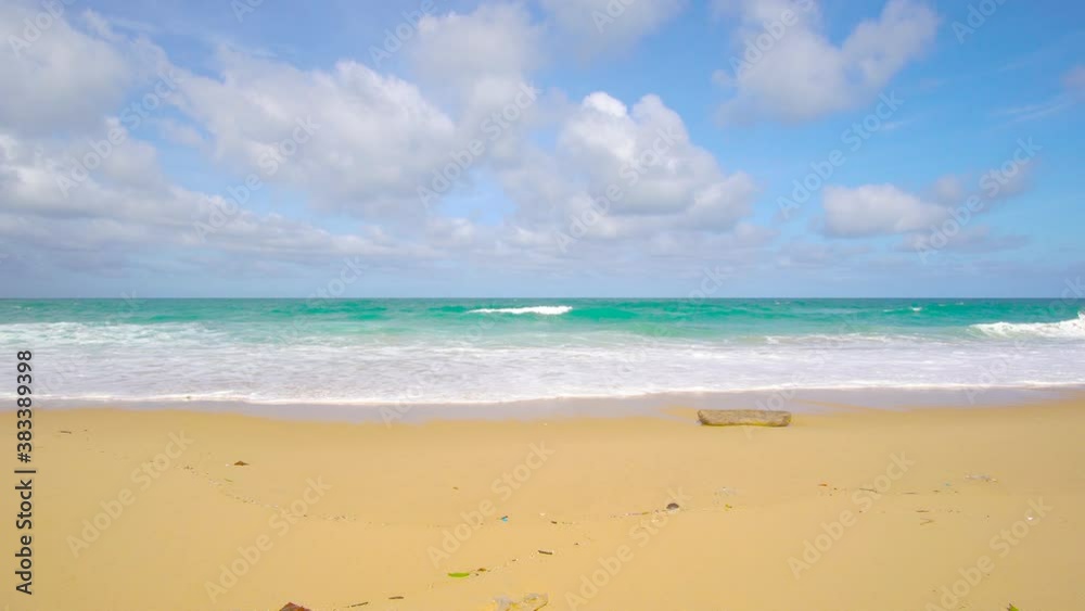 Nature video Phuket beach sea. Landscape view of beach sea and sand in summer sun. Beach space area background. At Naiharn beach, Phuket, Thailand. On September 2020. 4K UHD Videoclip Nature video Phuket beach sea. Landscape view of beach sea and sand in summer sun. Beach space area background. At Naiharn beach, Phuket, Thailand. On September 2020. 4K UHD Videoclip