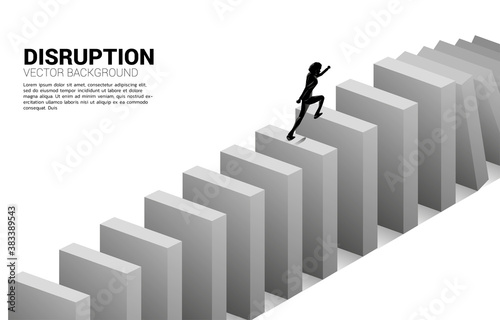 surviving business disruption. Silhouette of businessman running to domino collapse. Concept of business industry disrupt
