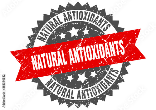 natural antioxidants stamp. grunge round sign with ribbon