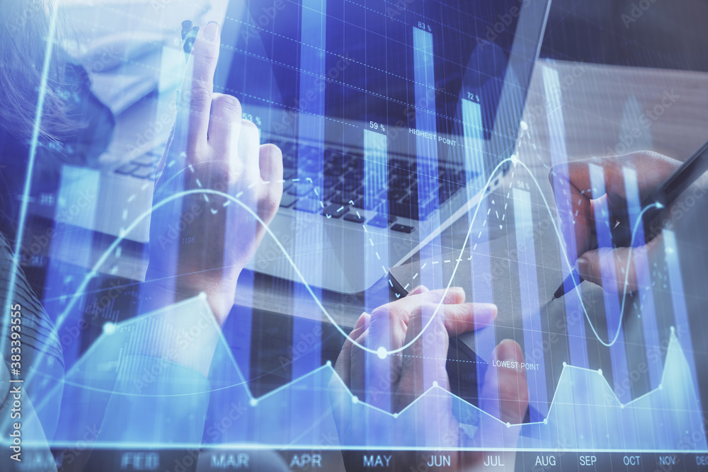 Double exposure of man and woman working together and forex chart hologram. Business concept. Computer background. Double exposure of man and woman working together and forex chart hologram. Business concept. Computer background.