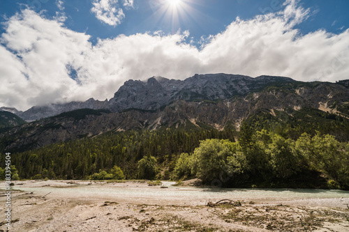 View of the Isar River close to Scharnitz village, austrian Alps, during the summer