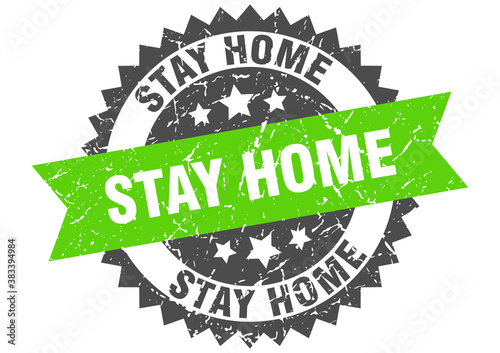 stay home stamp. grunge round sign with ribbon