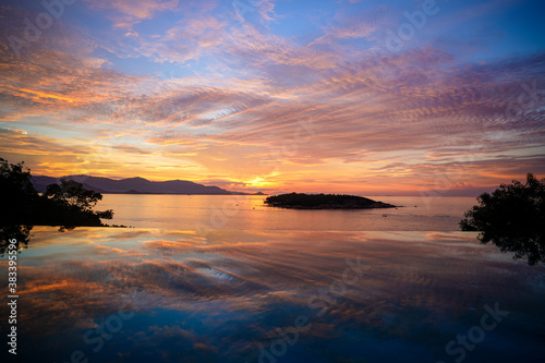 Amazing colorful Sunset and reflection over the Gulf of Thailand Bophut in Koh Samui photo
