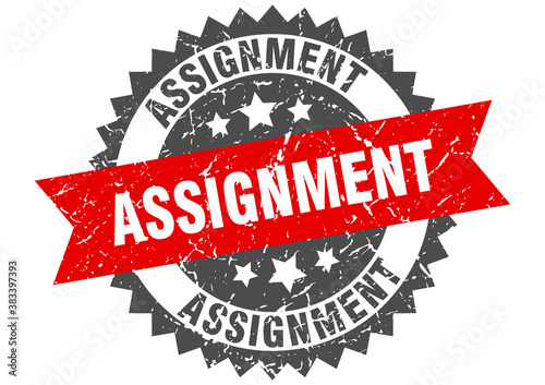 assignment stamp. grunge round sign with ribbon