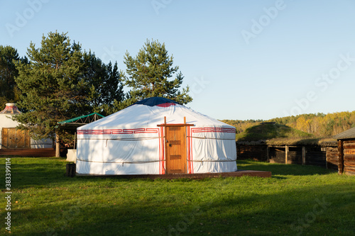 Buryat yurts on the background of a natural landscape. © vvicca
