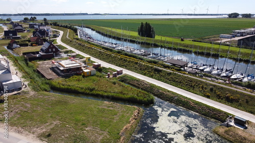 Aerial photo of the harbor in Numansdorp from South Holland beside the Haringvliet. photo