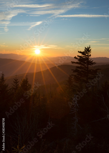 Endless layers of fog and trees within the blue ridge mountains of north carolina. Overlooks give way to a sea of mountains and hills filled with fall color during colorful sunrise and sunsets.