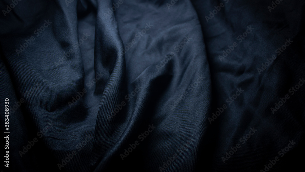 The surface of the black cloth with wavy marks The surface of the black cloth with wavy marks