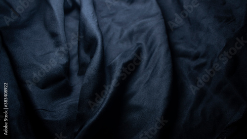 The surface of the black cloth with wavy marks