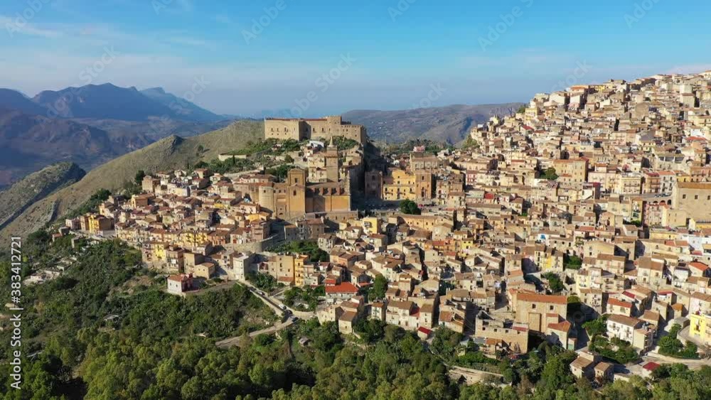 Caccamo, Sicily. Medieval Italian city with the Norman Castle in Sicily mountains, Italy. View of Caccamo town on the hill with mountains in the background, Sicily, Italy. Caccamo, Sicily. Medieval Italian city with the Norman Castle in Sicily mountains, Italy. View of Caccamo town on the hill with mountains in the background, Sicily, Italy.