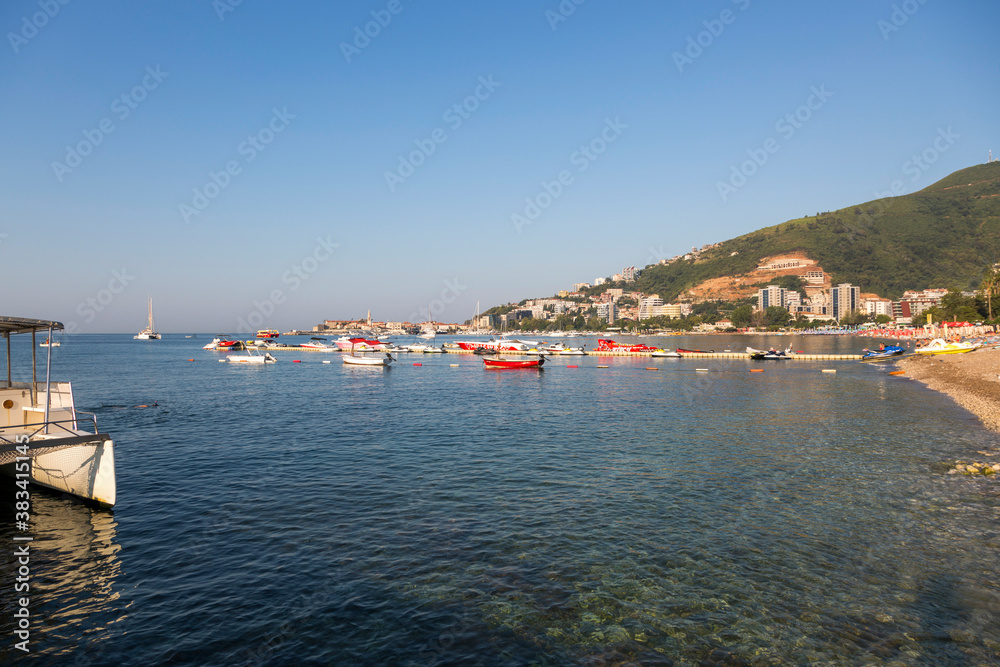 Panorama of the city of Budva in the rays of the rising sun