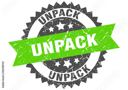 unpack stamp. grunge round sign with ribbon