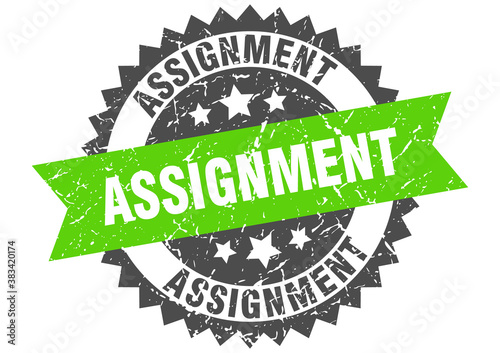 assignment stamp. grunge round sign with ribbon