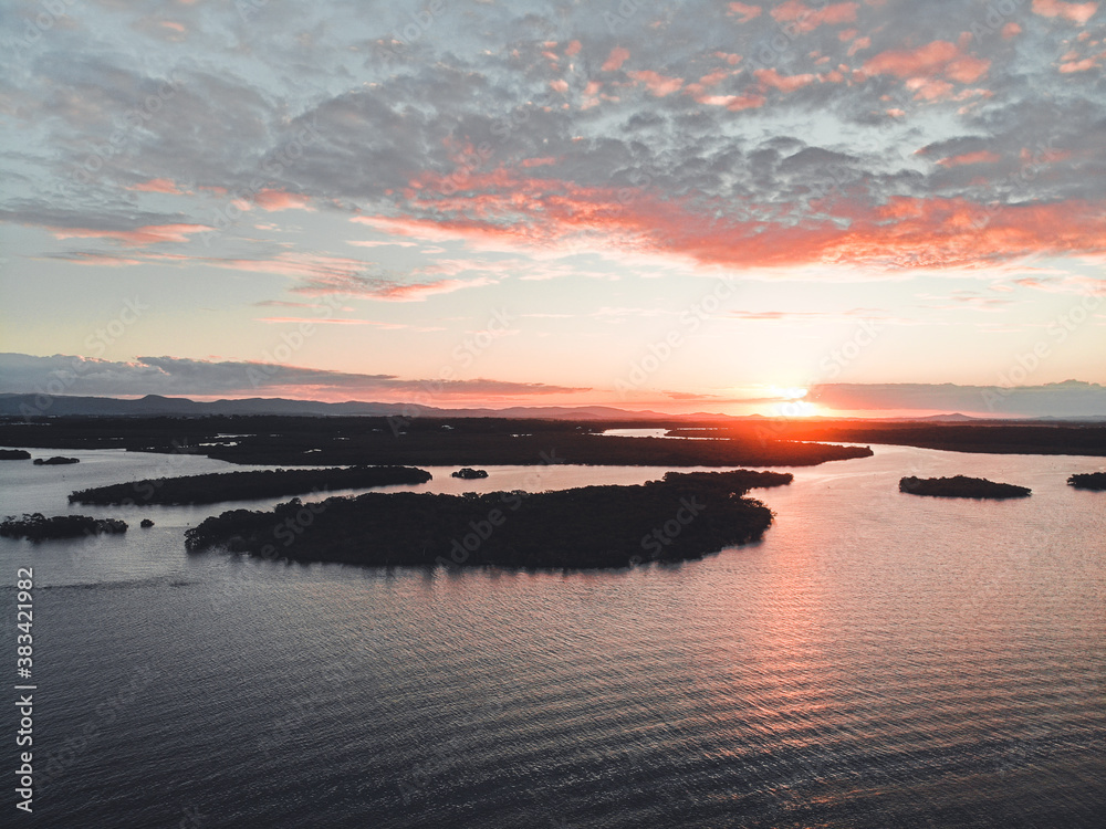 created by dji camera - sunset over the lake/sea/ocean