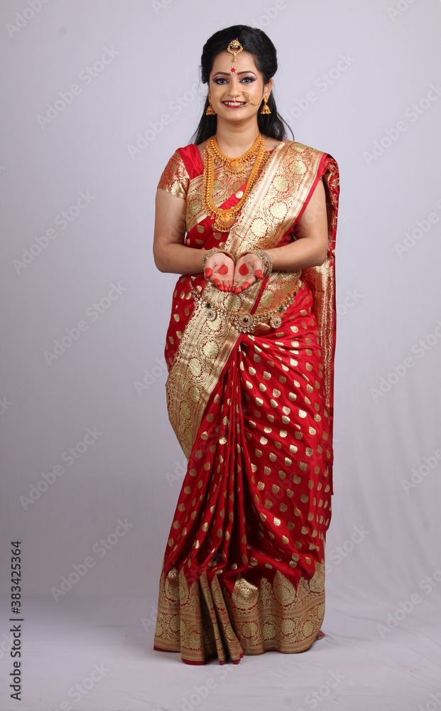 Indian Godess of prosperity / Lakshmi isolated on white. Indian Godess of prosperity / Lakshmi isolated on white.