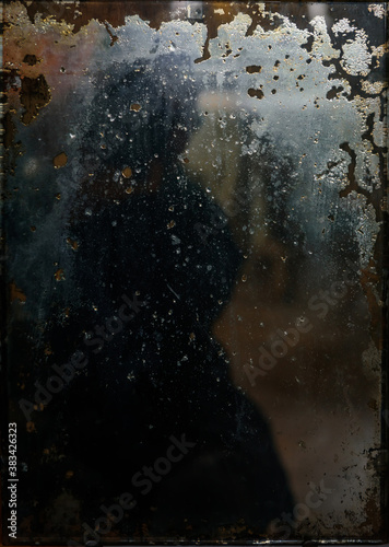 Reflection in old dark mirror. Antique, vintage, texture. Abstract image, background.