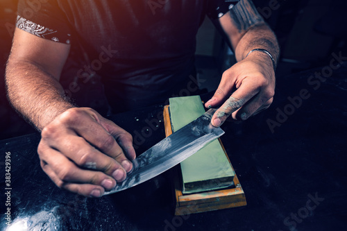 Sharpening the chef knife photo