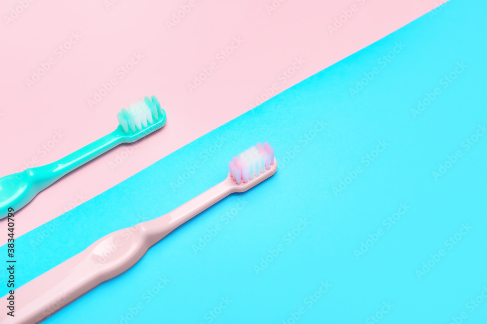 Tooth brushes on color background Tooth brushes on color background