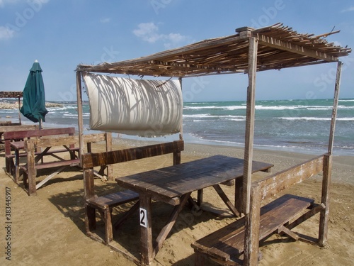 windy day on Caspian sea, empty beach photo