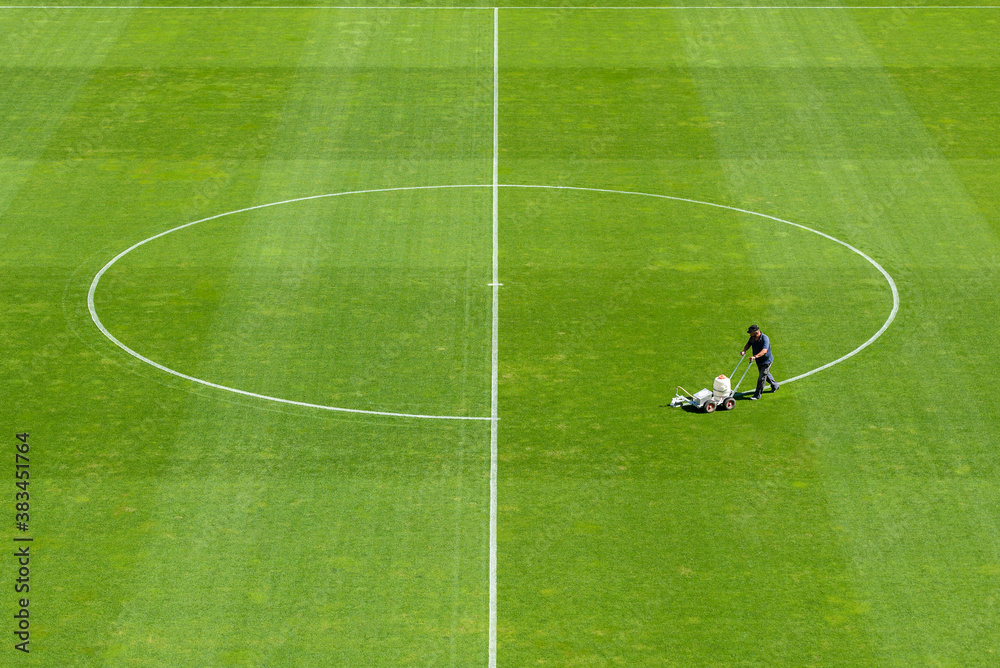 Painting line on a soccer pitch