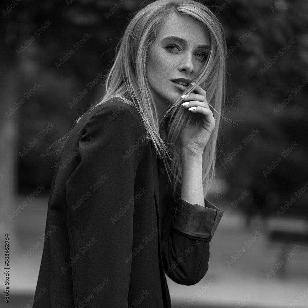 Portrait of stylish ginger girl with freckles happy looking at camera