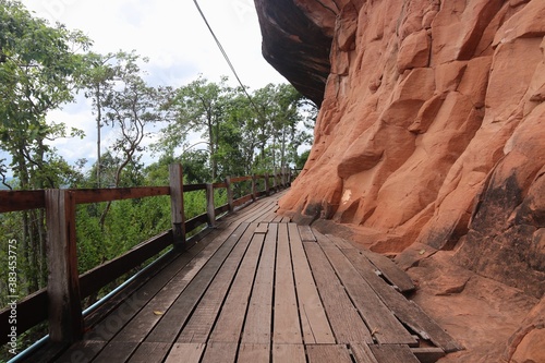 Wooden walkway on sandstone mountains at Phu thok temple Sri Wilai district Bueng Kan, Thailand. photo