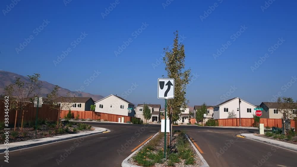 Pan right over empty street to new construction in progress Pan right over empty street to new construction in progress