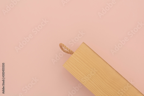 Fototapeta Naklejka Na Ścianę i Meble -  Wooden gift box or wooden box for wine on a pink background. copy space