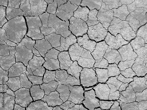 high angle view of crack soil ground in black and white photography
