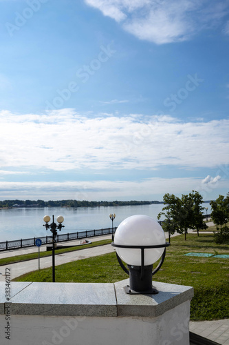 Round shiny lantern close-up. Bright summer day in the Strelka of Yaroslavl