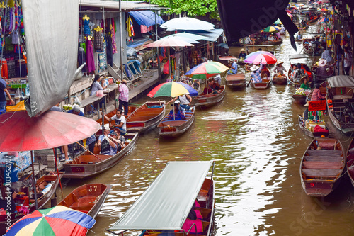 traveler in floating market © thelittlebee