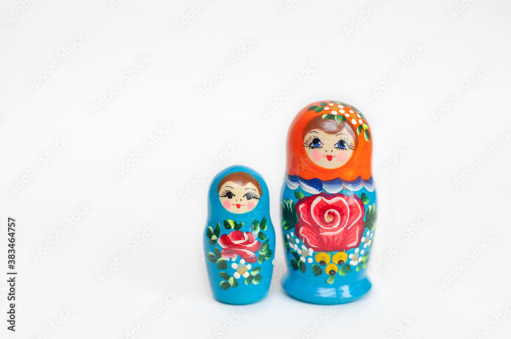 set of wooden dolls of 2 pieces on a white background set of wooden dolls of 2 pieces on a white background
